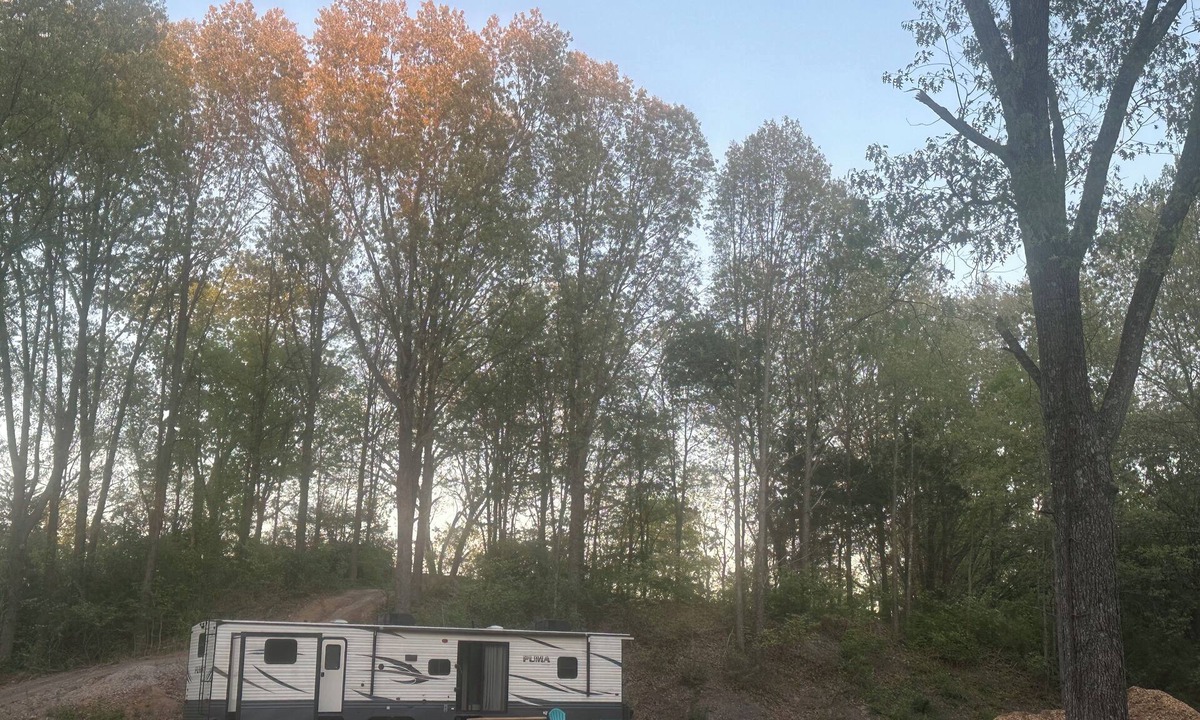 Carterville RV Rental | Experience Glamping in style. Private Lake - Pet Friendly!