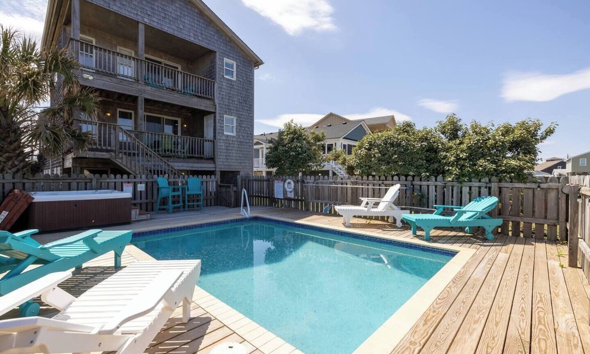 Southern Shores Cottage | Ocean Views, Game Room, Pool/HT, Pets + EV Charger