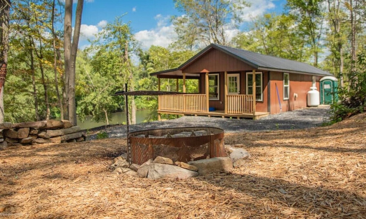 Farrandsville Cabin | Off grid; River front getaway, boat. Firepit, woodland; Generator. 2 Bedrooms.