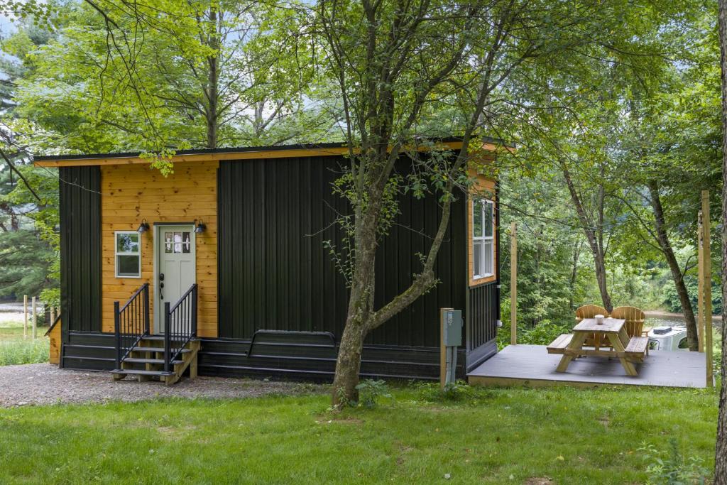 Johnson House | Riverside Tiny House with hot tub near Stowe
