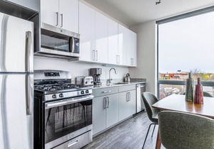 Charming Logan Square 2BR w/Gym, Roof Deck, 1 block to L, by Blueground