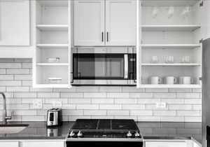 Elegant Elmhurst 1BR w/Lounge, Pool & Gym nr Metra, by Blueground