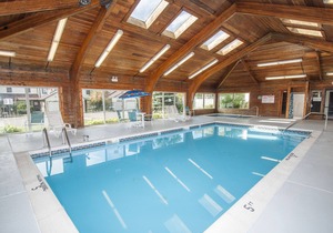 Lakefront townhome with lake views & heated indoor community pool!