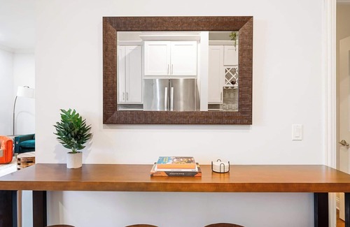 Near West Side Apartment | Balcony, Gym, 1 Garage Parking, Sleeps 10!