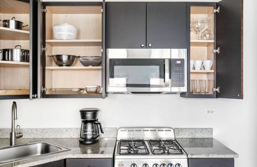 Gold Coast Apartment | Bright Gold Coast 1BR w/Doorman & Gym, 2 blocks to L, by Blueground