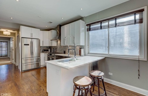 Pulaski Park Condo | Centrally Located Condo with Parking and Deck!