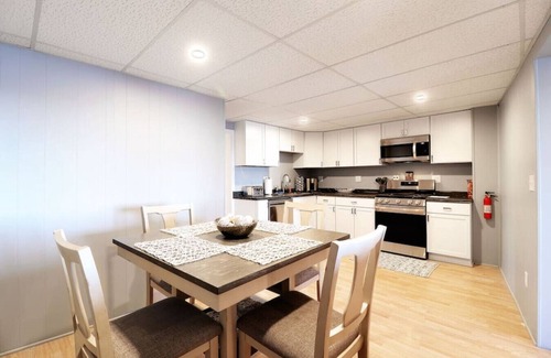 Ingleside Apartment | Chain O' Lakes Beach Penthouse Sunset View and Boat Dock