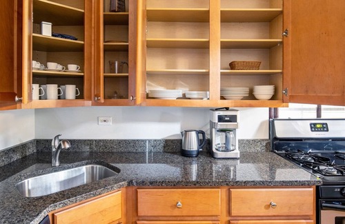 Park West Apartment | Expansive Lincoln Park 2BR, walk to L + Clark Street dining, by Blueground
