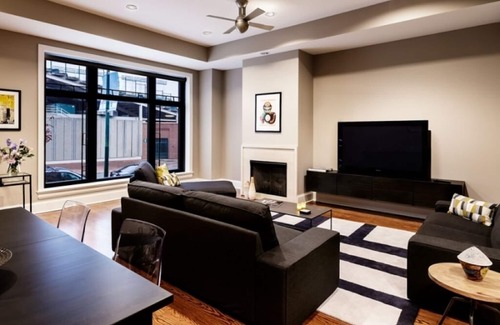 Lakeview Condo | Featured on the Travel Channel, 4 Bedroom 2 Bath in Wrigley Rooftop Building