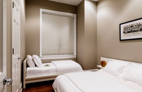 Lakeview Condo | Featured on the Travel Channel, 4 Bedroom 2 Bath in Wrigley Rooftop Building
