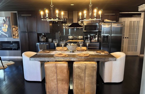 Buena Park Condo | Lakefront high-rise unit with spectacular lakefront & marina views!