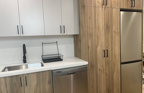 Woodbine Heights House | 1BR Main Floor Toronto | 15 Min Downtown + Parking