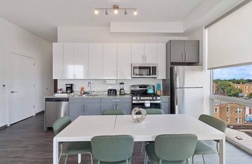 Palmer Square Apartment | 2BR City Loft Sweeping Glass Views