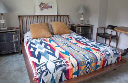 Flanders House | A "tree house", steps from a beautiful crescent beach great for windsurfing