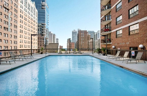 Rush and Division Apartment | Airy Gold Coast 2BR w/Gym, Pool, near. Oak St. Beach, by Blueground