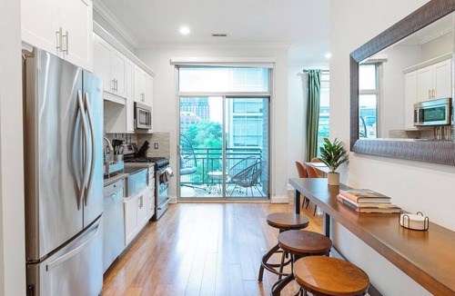 Near West Side Apartment | Balcony, Gym, 1 Garage Parking, Sleeps 10!