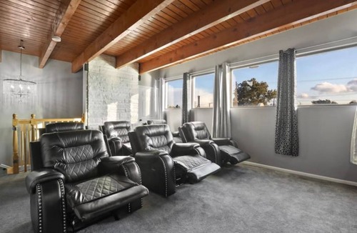 Belmont Cragin Apartment | Belmont Pleasures - hot tub/arcade gaming room