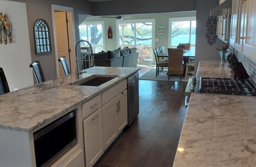 Round Lake House | Brand new from the studs to the pillows! The Lakeshore House.