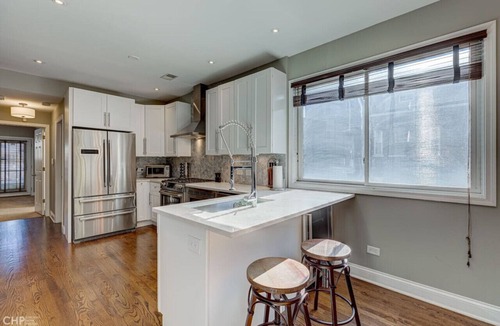 Pulaski Park Condo | Centrally Located Condo with Parking and Deck!