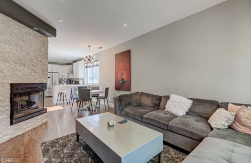 Pulaski Park Condo | Centrally Located Condo with Parking and Deck!