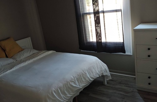 Lindenwood House | Charming 2-bedroom townhome in fabulous Normal with WiFi, AC
