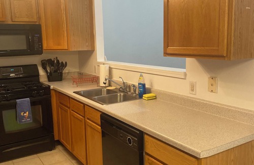 DeKalb House | Charming 3-bedroom townhome in delightful DeKalb with WiFi, AC
