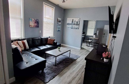 Avondale Apartment | Charming 4-bedroom apartment in delightful Chicago with central heat/AC, WiFi.