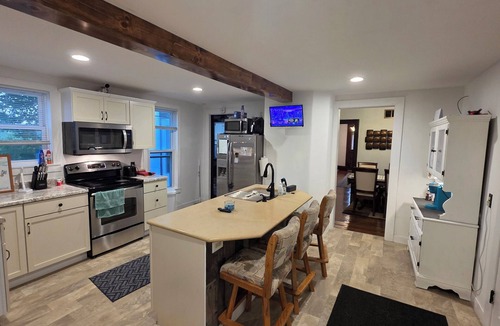 Medina House | Charming 4-bedroom farmhouse in Waterloo with fully updated interior.