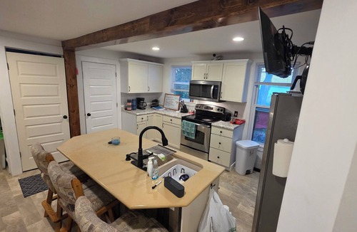 Medina House | Charming 4-bedroom farmhouse in Waterloo with fully updated interior.