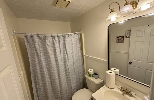 Collinsville House | Charming Home Tucked Away and Near Major Restaurants and Stores
