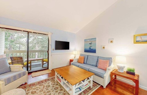 Brewster Apartment | Charming second-floor retreat with a full kitchen and balcony view