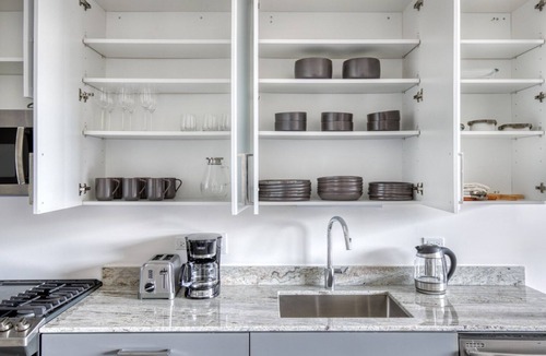 Logan Square Apartment | Chic Logan Square Studio w/Roof Deck & Gym, 1 block to L, by Blueground