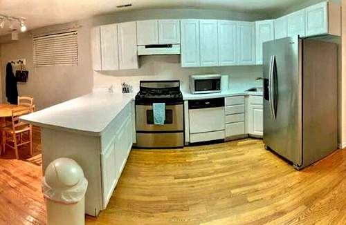 Wrightwood Neighbors Apartment | Cozy Depaul/Wrigley Garden Condo +FREE Parking!