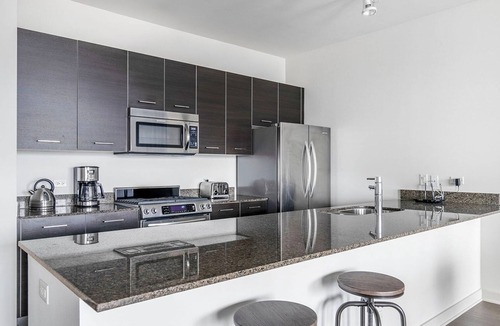 River West Apartment | Delightful River West 2BR w/Gym & Firepits, nr L Stop, by Blueground