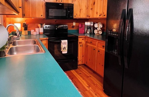 Hidden Lake Cabin | Discover tranquility at Hidden Oasis, a charming home nestled in serene Cherry Log Mountain