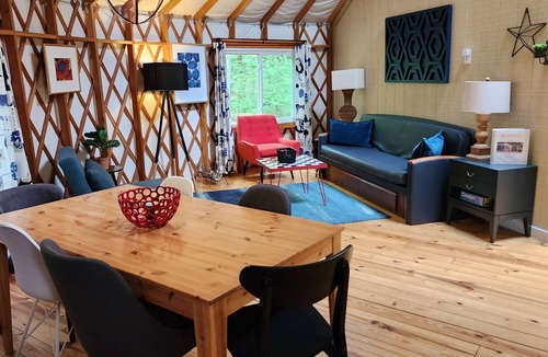 Mill Spring House | Dog friendly 30' Yurt, large dome skylight, king bed, 2 bedrooms, sleeps 6.