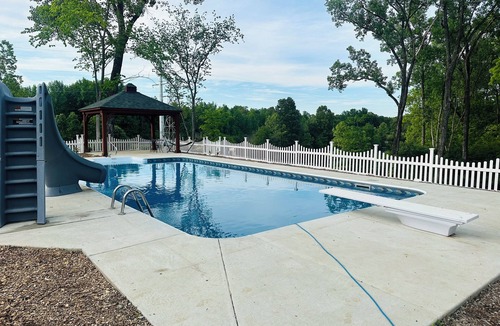 Carterville RV Rental | Experience Glamping in style. private Hot tub spa! Private lake -Pet Friendly