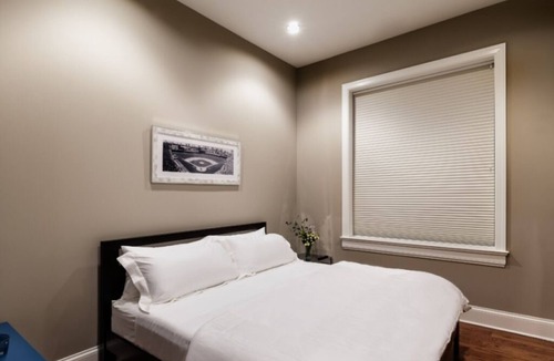 Lakeview Condo | Featured on the Travel Channel, 4 Bedroom 2 Bath in Wrigley Rooftop Building