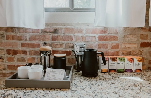 West Lakeview Condo | Gather Together & WFH in Piece of Chicago History
