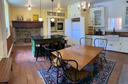Calvin House | Historic stone farmhouse with rail trail and river access