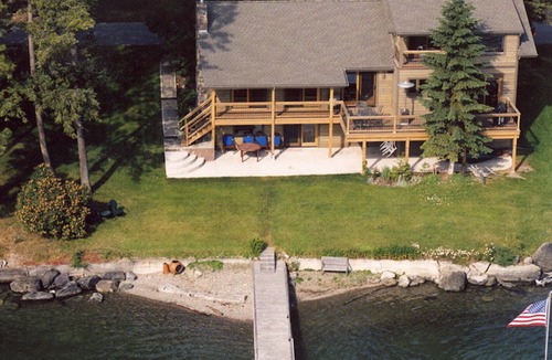 Lakeside House | Just steps from Flathead Lake's shore, this fine home offers dock, views, value.