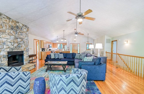 Livingston House | Lakefront home with deck, hot tub, game room, kayaks, & fireplace