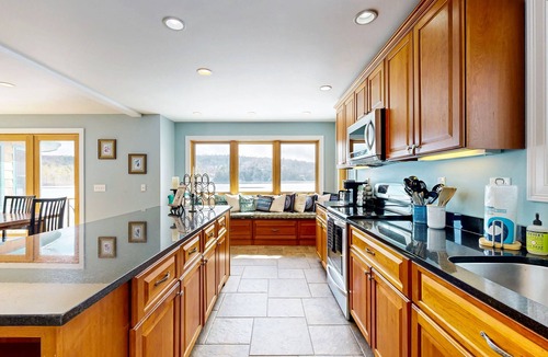 Casco House | Lakefront Retreat | Private Sandy Beach, Dock & Firepit | Game Room