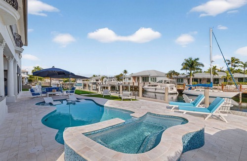 Lighthouse Point Villa | Lighthouse 6 BR Mansion, 90ft waterfront dock, heated pool, hot tub and more!