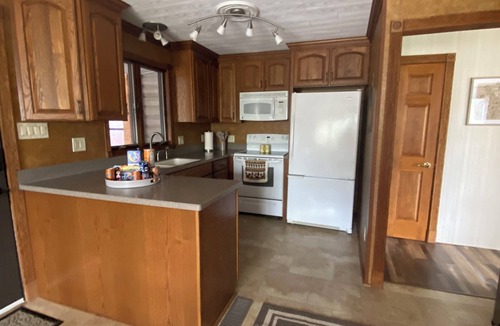 Scheller House | Little Muddy Hideout: 3-bedroom tri-level house secluded on 10 acres in country.