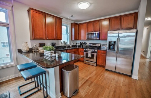 Near West Side Condo | Long-Term Stays | 1 Garage Parking | Private Balcony