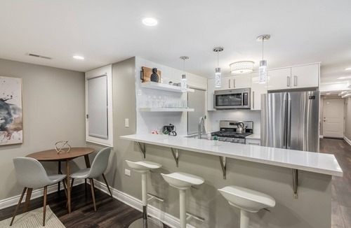 Park West Apartment | Lovely Garden Set up is Perfect for Your Morning Coffee or a Drink After Some Great Blues Music at Kingston Mines by AllSet Turnover