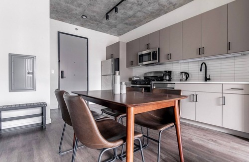 Killgubbin Apartment | Lovely River North 1BR w/Grills, Terrace + Fire Pits, by Blueground
