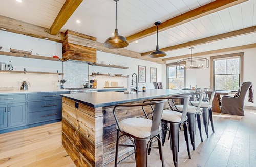 Bolingbrook Condo | Luxury mountain home with fireplace, children's items, & expansive outdoor space