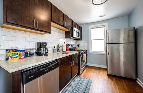 Avondale Apartment | Modern 3-Bed Stay w/Patio, Firepit, & Garage Parking Spot